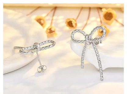 TWISTED BOW EARRINGS (PREORDER 8/8)