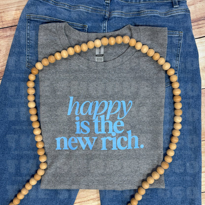 HAPPY IS THE NEW RICH