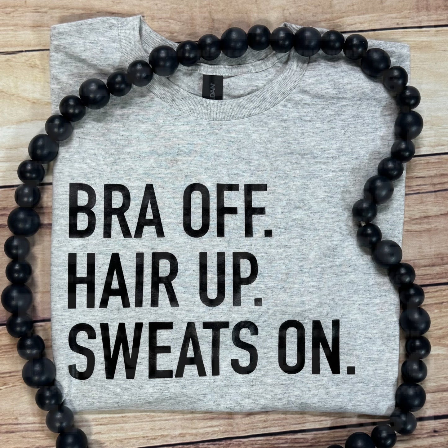 BRA OFF. HAIR UP. SWEATS ON.