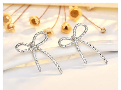 TWISTED BOW EARRINGS (PREORDER 8/8)