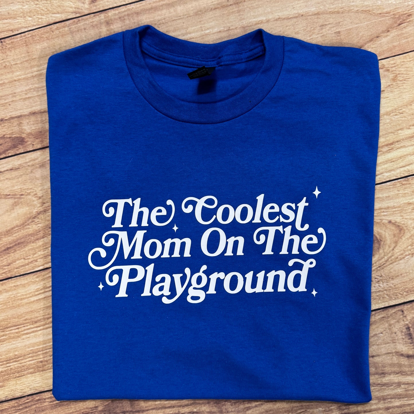 THE COOLEST MOM ON THE PLAYGROUND