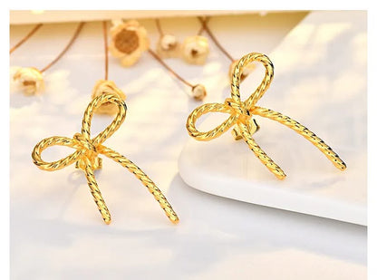 TWISTED BOW EARRINGS (PREORDER 8/8)